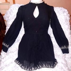 This is a romper, very sophisticated for almost any occasion.